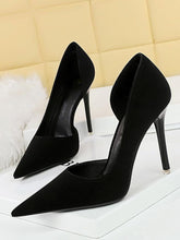 Tacones altos retro con punta hueca lateral